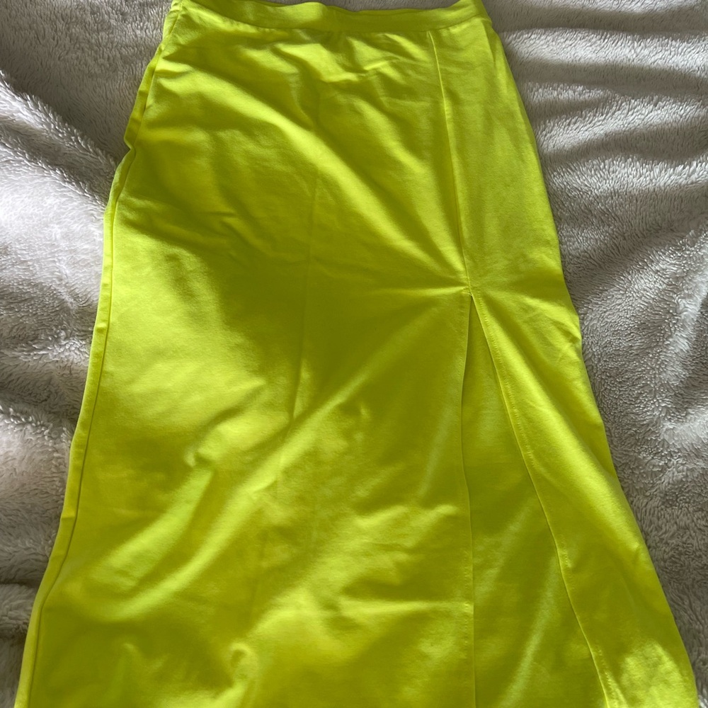 Neon green midi skirt with slit at bottom